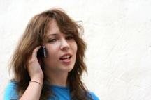 Teenaged girl talking on a cell phone.