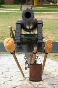 A cannon with all the equipment needed to prepare and fire a shot. Vintage Civil War artillary